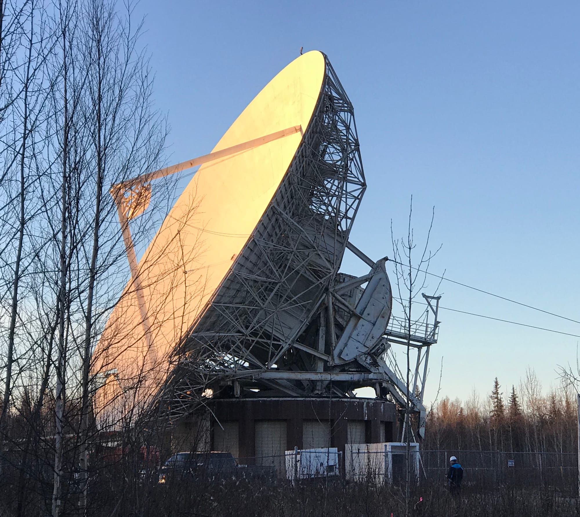 Locals Gather to Witness Satellite Dish Removal