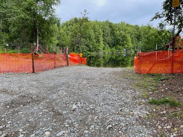Temporary fence installed at Benka Lake, July 29, 2024