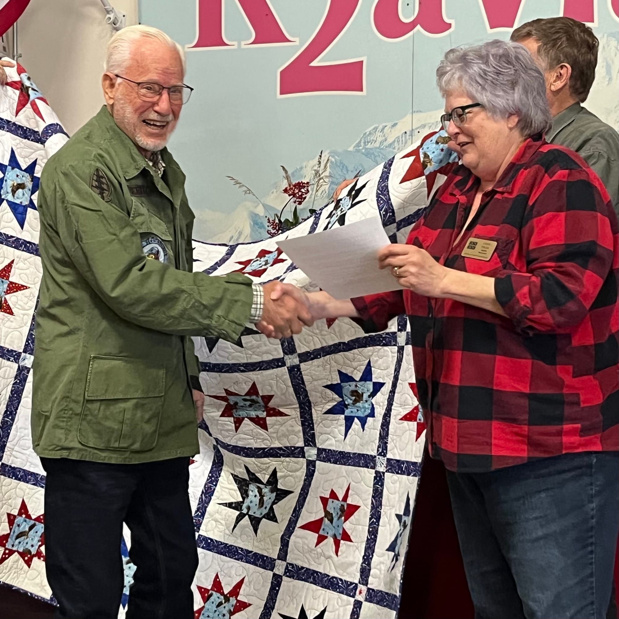 Quilts of Valor Comforts Local Veterans