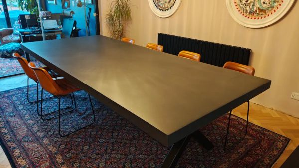 Everyday durability and care guide for bespoke dining tables covering heat, stains, scratches and simple maintenance