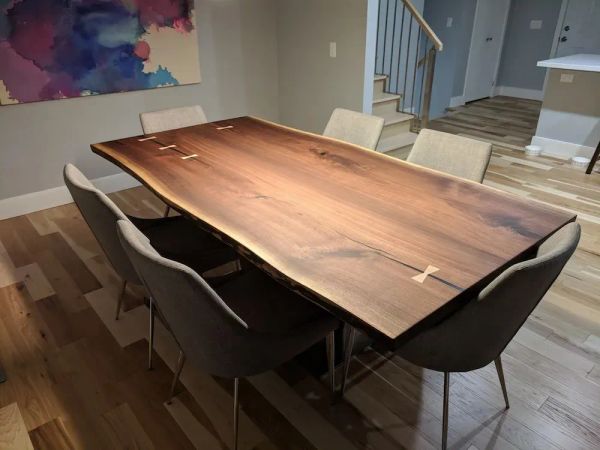 Statement live edge dining table with bow ties
