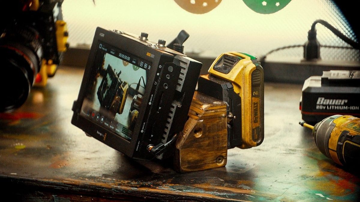 How One Solo Filmmaker Built a Professional Monitor Rig From Scrap Wood and a License Plate