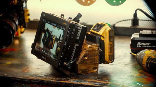 How One Solo Filmmaker Built a Professional Monitor Rig From Scrap Wood and a License Plate