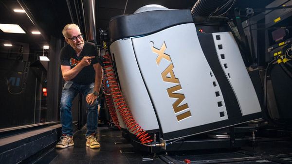 Adam Savage Goes Inside IMAX to Show How 70mm Film Projection Actually Works