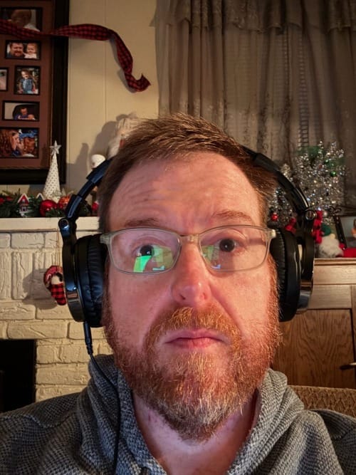 I look like I'm listening for aliens in a SETI broadcast.