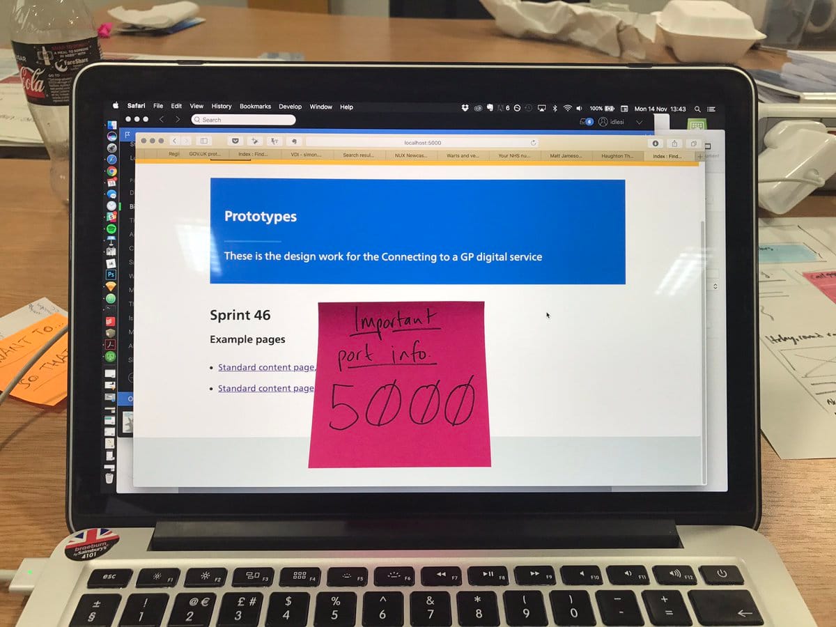 A picture of my MacBook with a reminder I need to use port 5000 to view it locally.