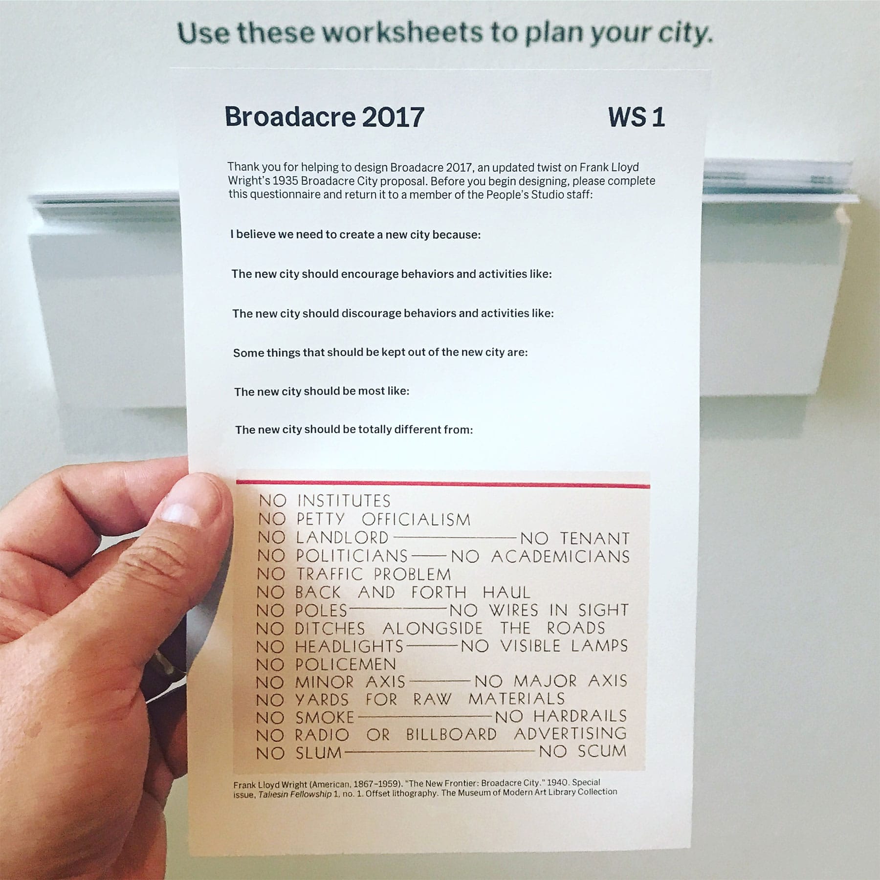 A shot of me holding a leaflet at MoMA - I will detail it in a second