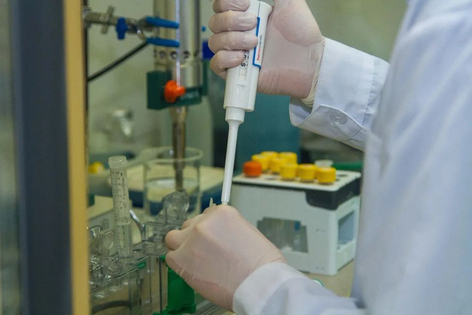 Picture of a scientist doing work that illustrates the importance of a lab notebook