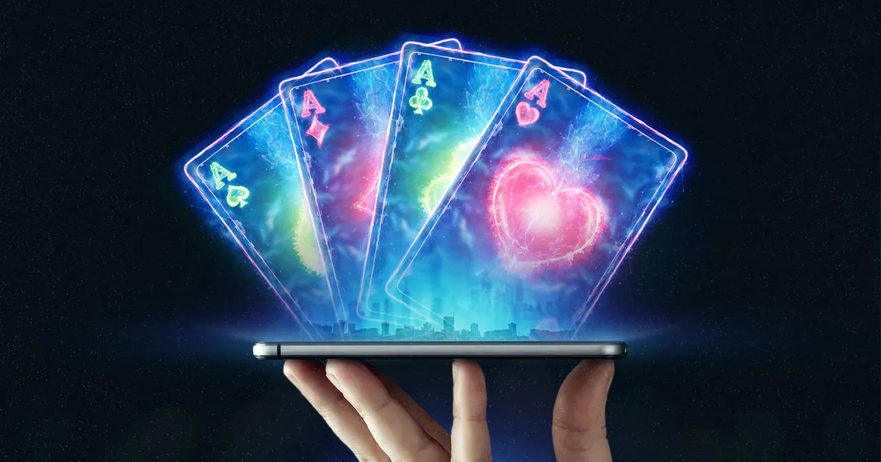 Playing cards coming out of a smartphone