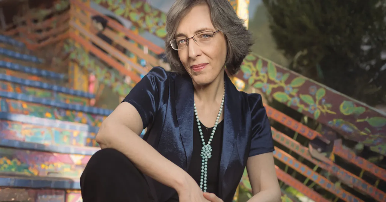 Photo of Alba sitting on steps