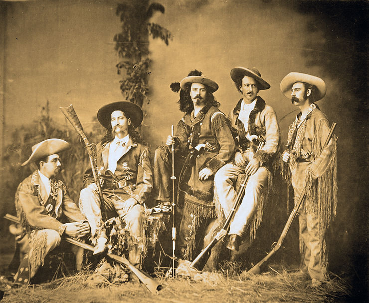 Texas Jack (second from right) with Buffalo Bill (center), and Wild Bill Hickok (second from left).