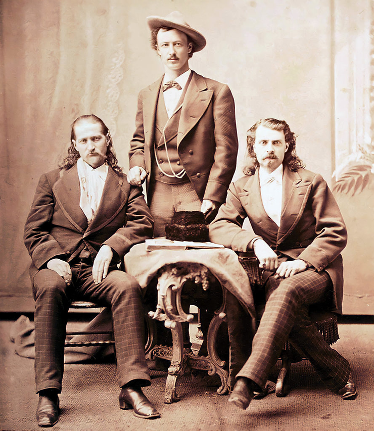 Left to right: Wild Bill Hickok, Texas Jack Omohundro (standing), and Buffalo Bill Cody