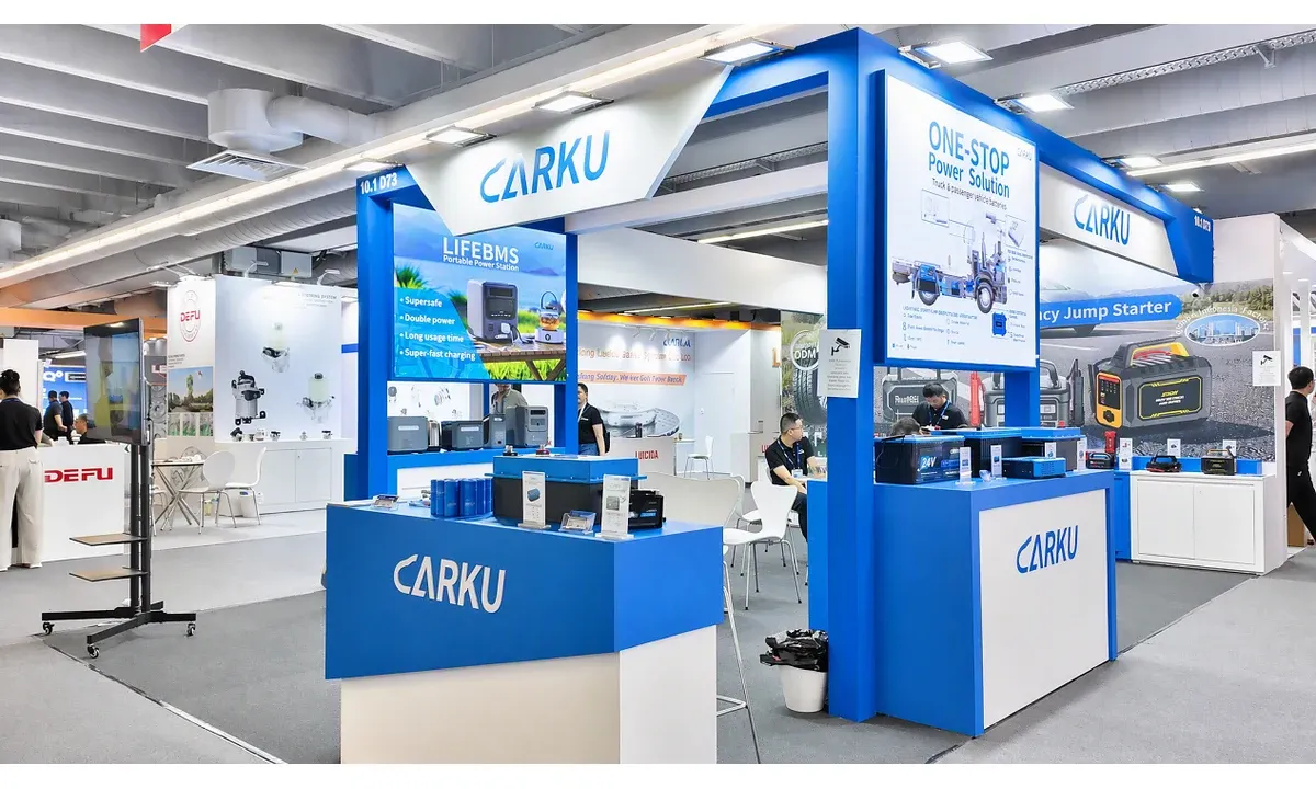 CARKU display at Automechanika Frankfurt showing jump starters and battery products.