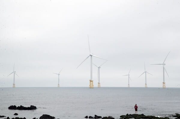 A view of the Hallim offshore wind turbines seen from the coastal road in Hallim-eup, Jeju City.