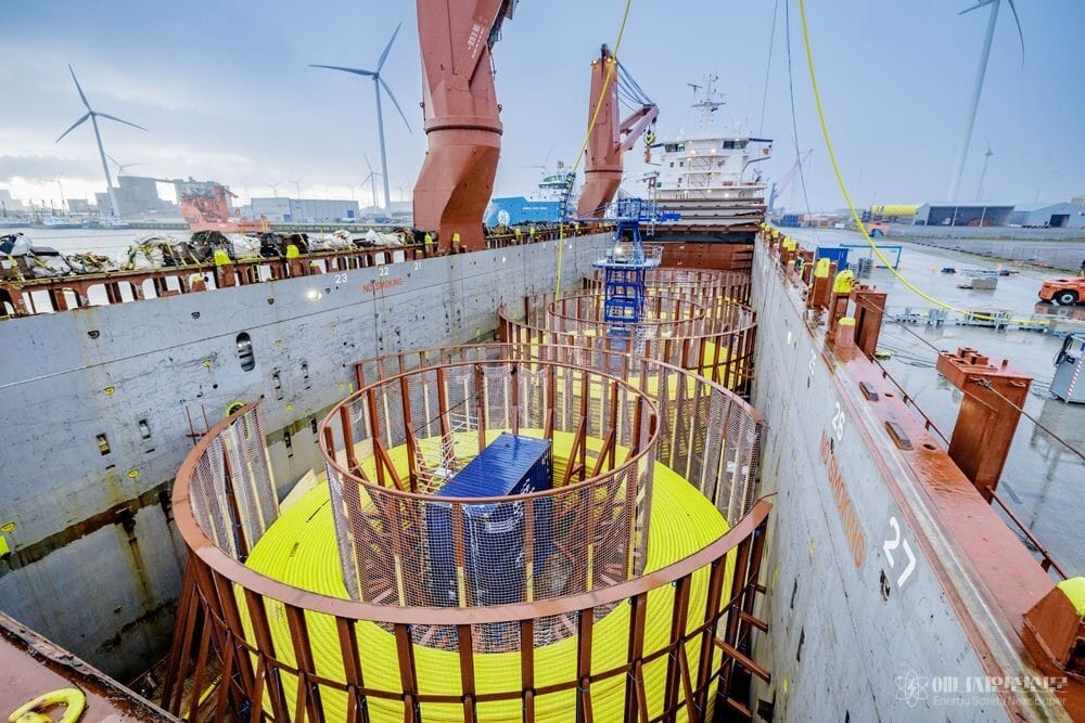 An inter-array submarine cable for offshore wind power produced by TKF is being loaded onto a large cable basket on a ship in Eemshaven, Netherlands.