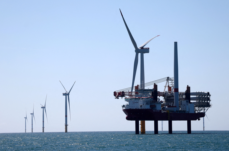 A work vessel operates at an offshore Atlantic wind farm off the coasts of Yeu Island and Noirmoutier Island in western France.