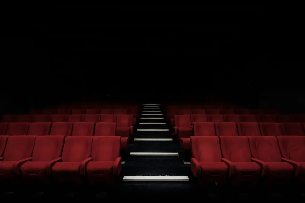 A theatre filled with empty seats.
