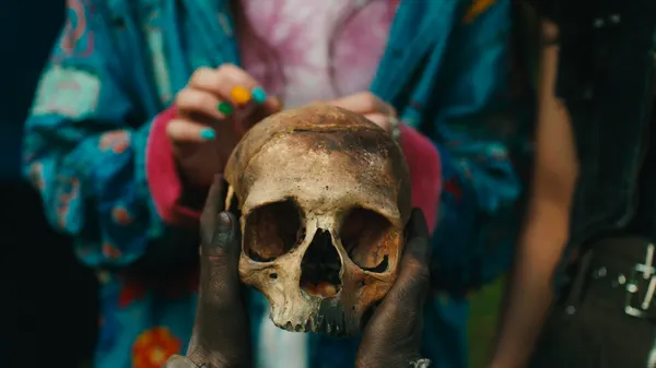 "In The Palm of Her Hand" Finds Tenderness in an Unmarked Grave
