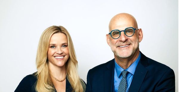 Reese Witherspoon Teams up with a Mystery Man