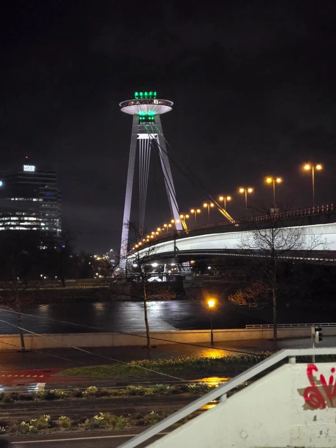 Bridge at night with streetlamps 