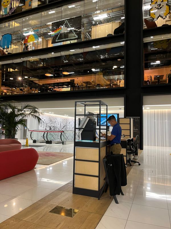Sinister masquerading as cute, pixels art adorns the grand atrium, while security keep a combat trousered eye on your id or g