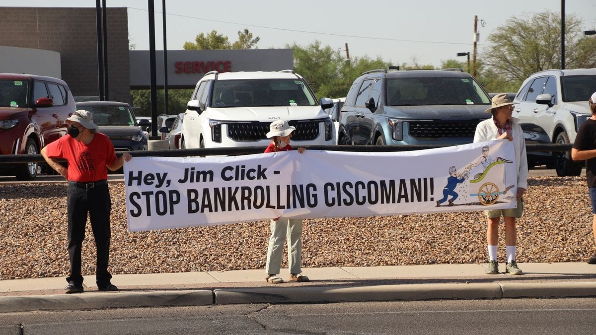 Tucson protesters take aim at political backers