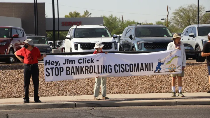 Tucson protesters take aim at political backers