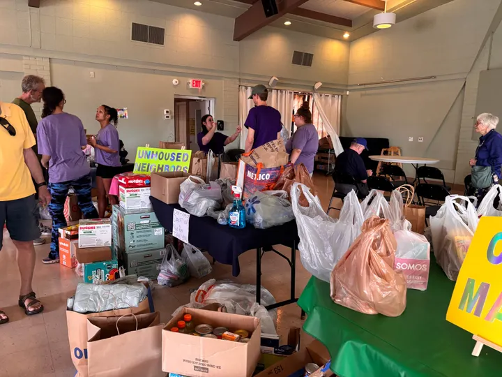 Tucson event honors John Lewis with food, housing drive
