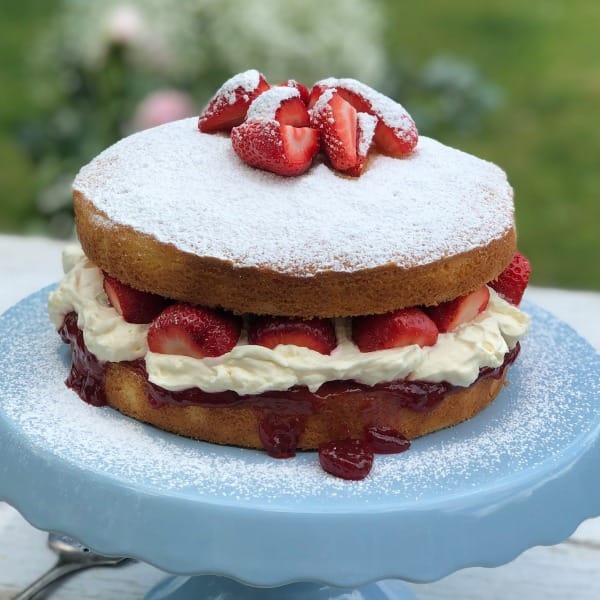 fruit cake on blue cake holder