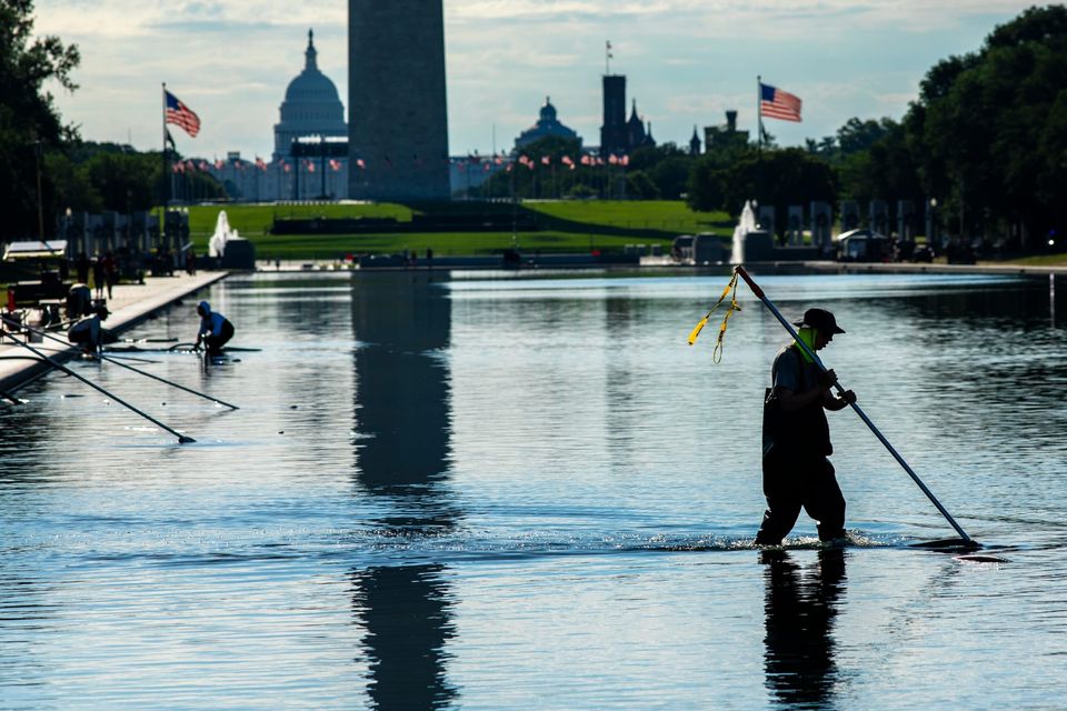 Another Act in the Lincoln Memorial Reflecting Pool Circus