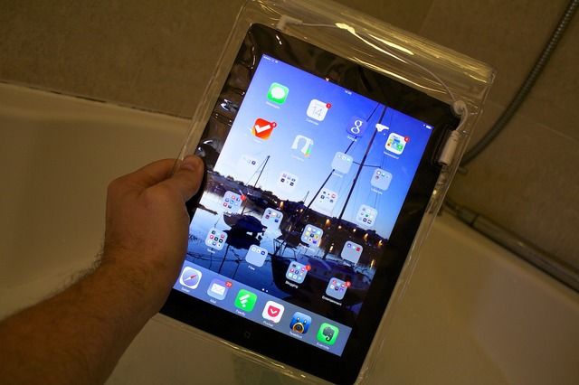 An iPad in a Bath condom