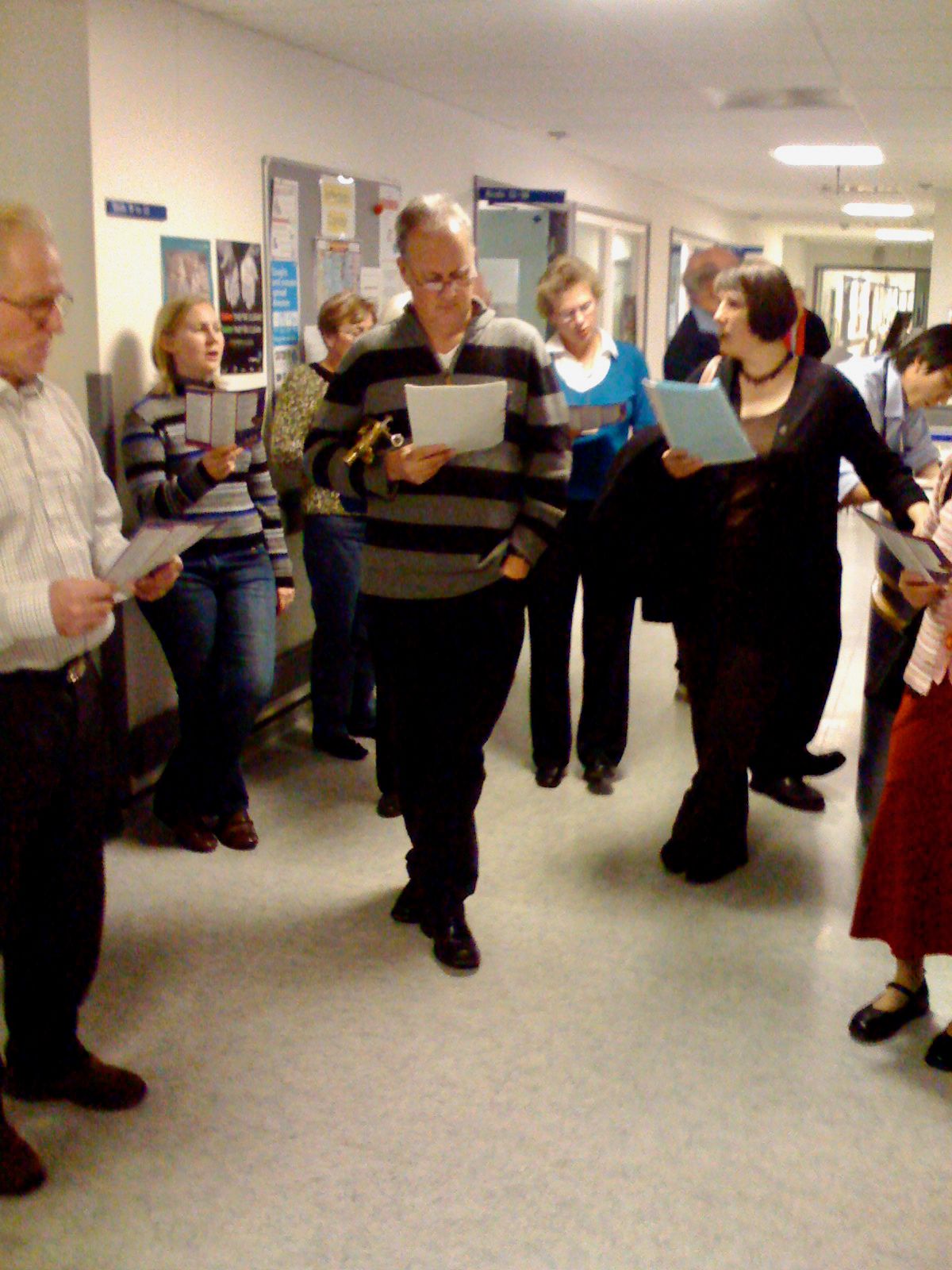 Carol singing in the wards of St George's hospital, Tooting. 