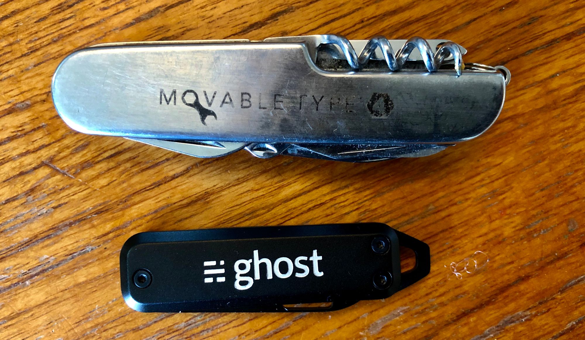 A Movable Type penknife above a Ghost penknife.