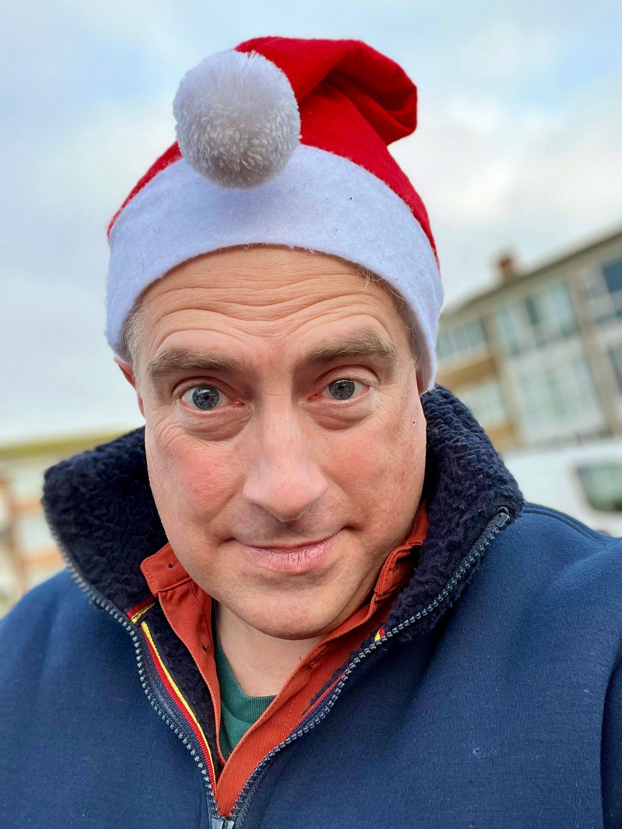 Adam Tinworth wearing a Santa hat