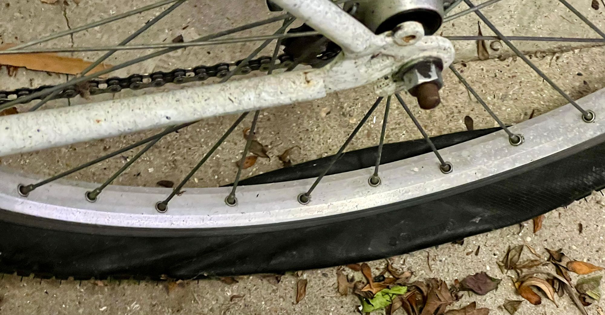 A photo of a very flat bike tyre.