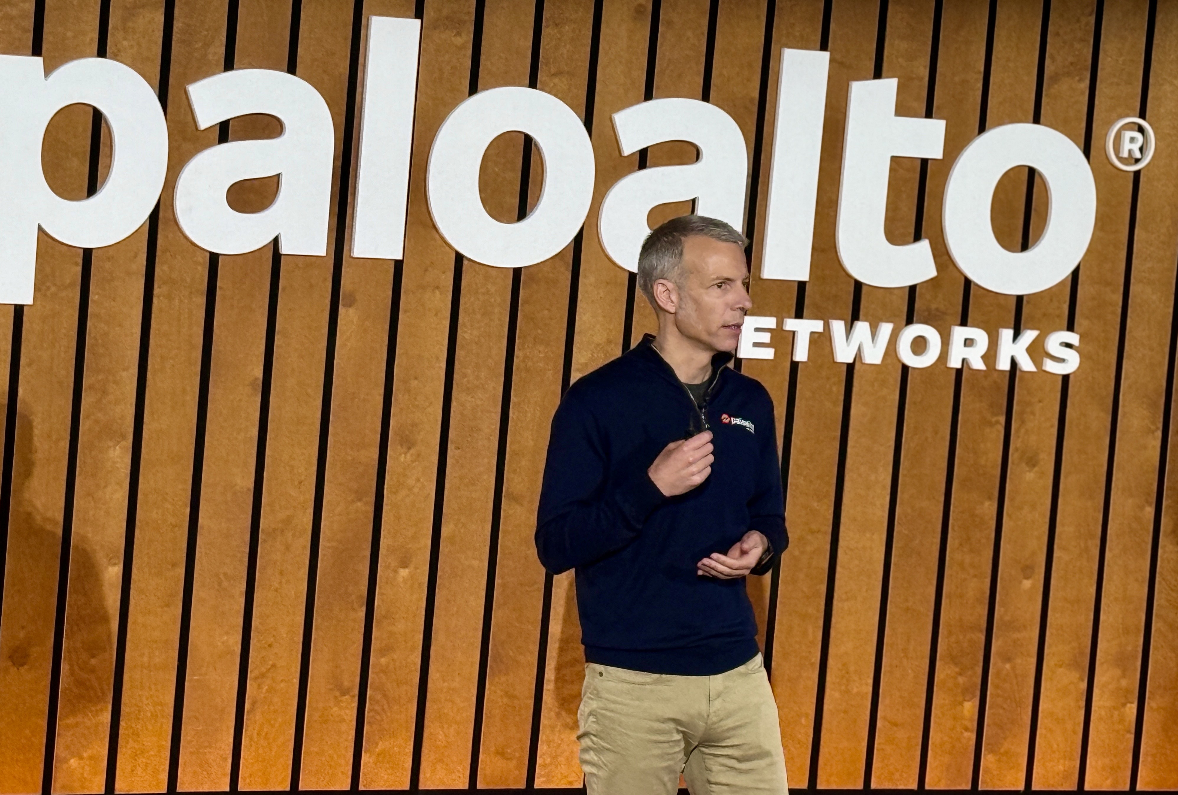 Palo Alto Networks chief product officer Lee Klarich, speaking at an event during RSA on April 28, 2025 in front of a sign bearing the company's name.