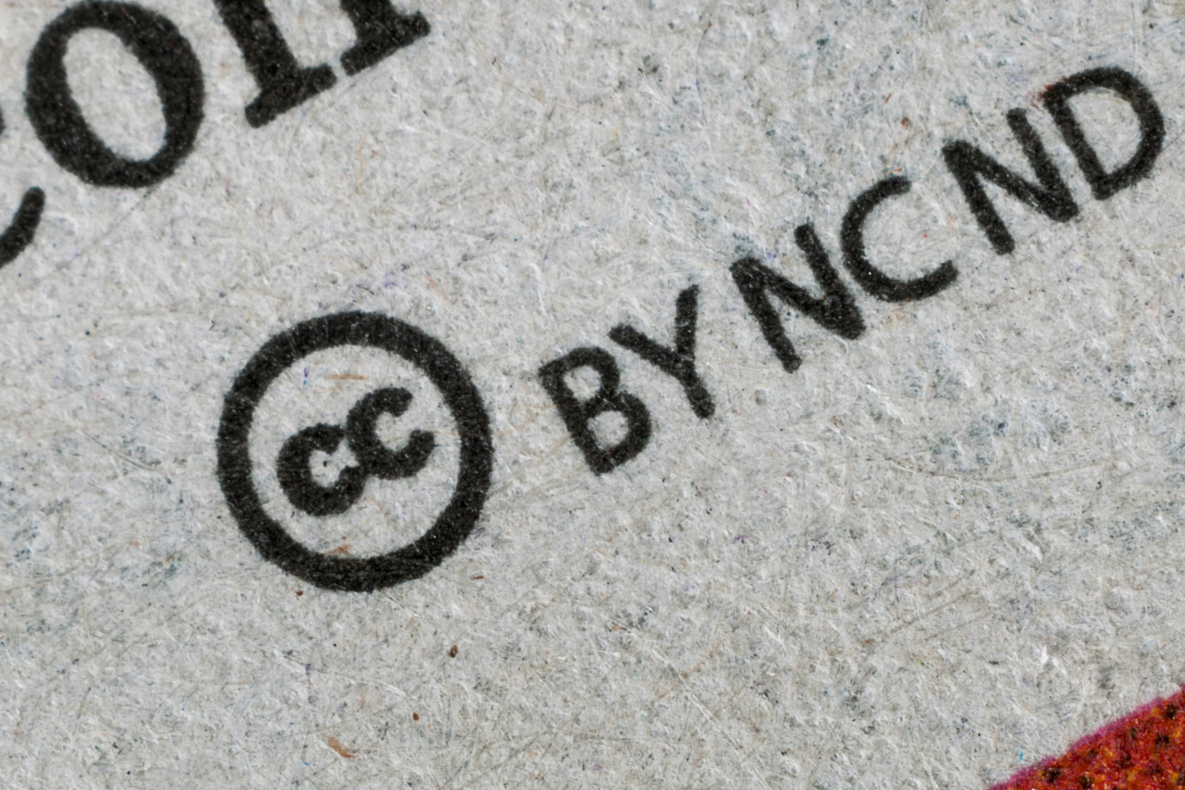 Creative Commons CC symbol on sidewalk art.