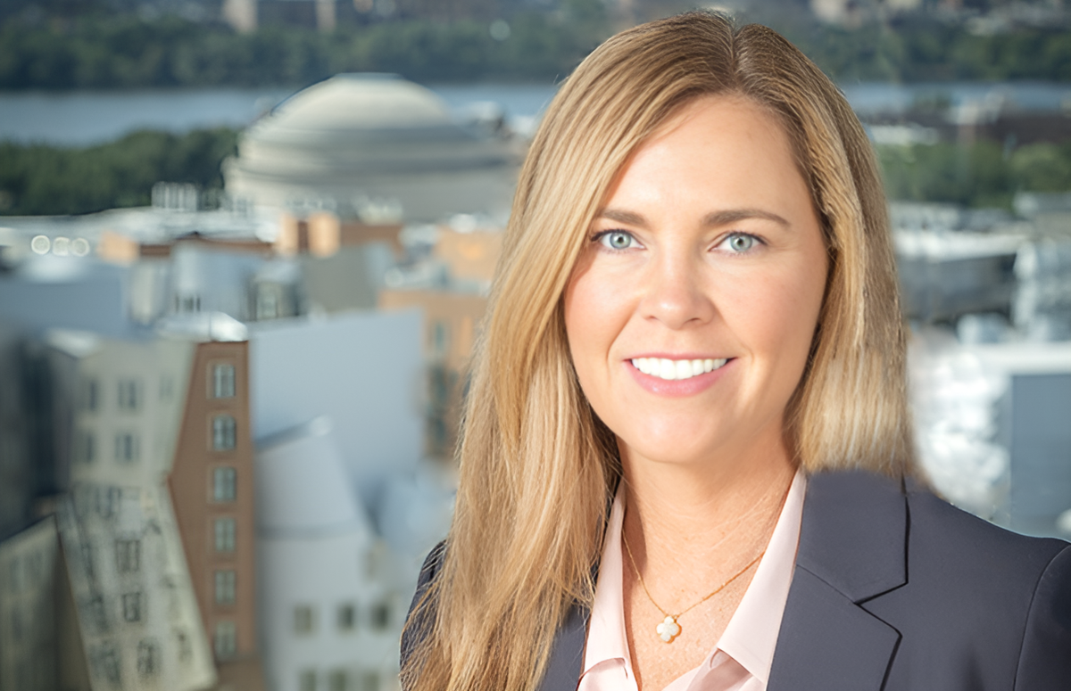 Akamai CIO Kate Prouty over a picture of Cambridge, MA.