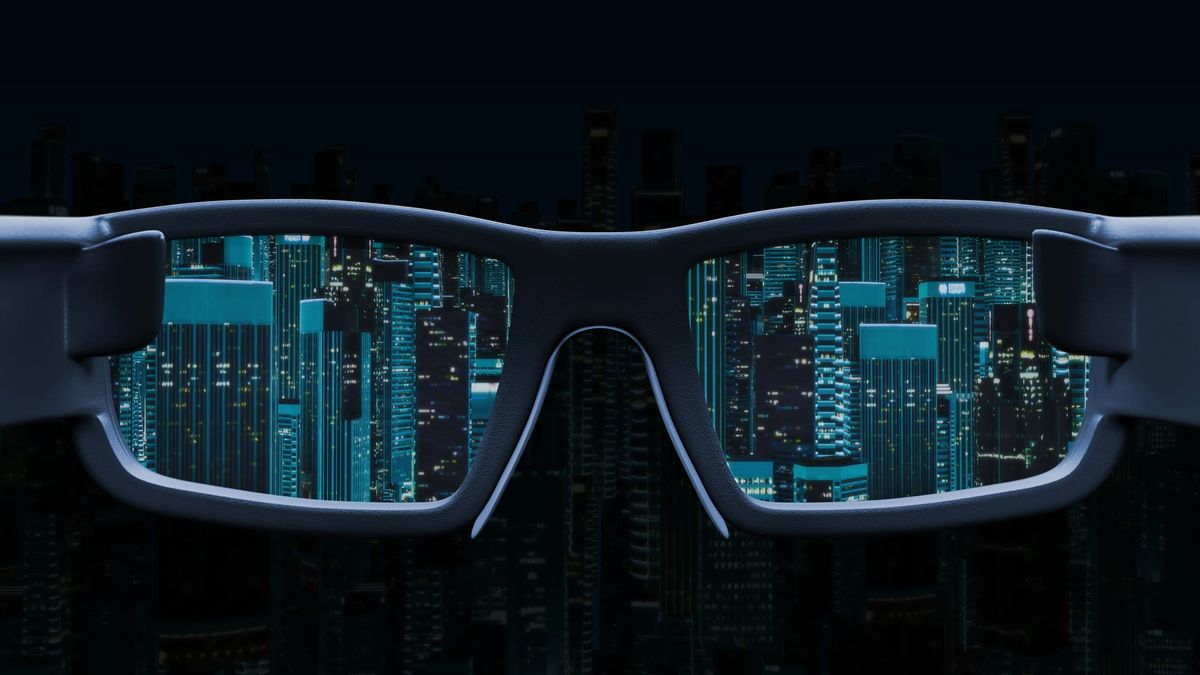 Futuristic cityscape glowing through dark-framed glasses.