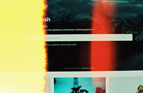 Search bar displayed on a website homepage with abstract light effects.