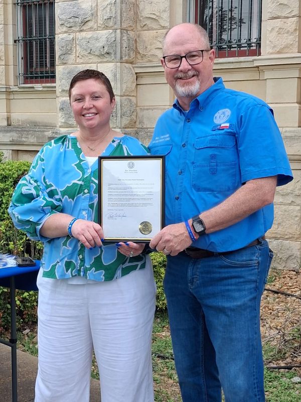 Courthouse Lawn Turns Blue: Milam County Signs Proclamation to Protect Local Youth