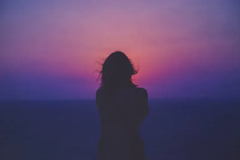 Lone silhouette at dusk — a junior left alone without guidance or support