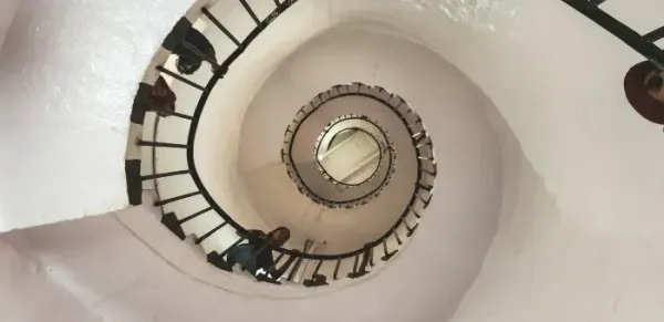 Spiral staircase viewed from above, symbolizing iteration through enum keys and values