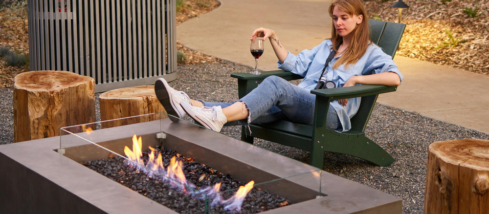 Elevate Your Outdoor Living Spaces with Propane Fire Pits: A Guide to Ambiance, Design, and Safety