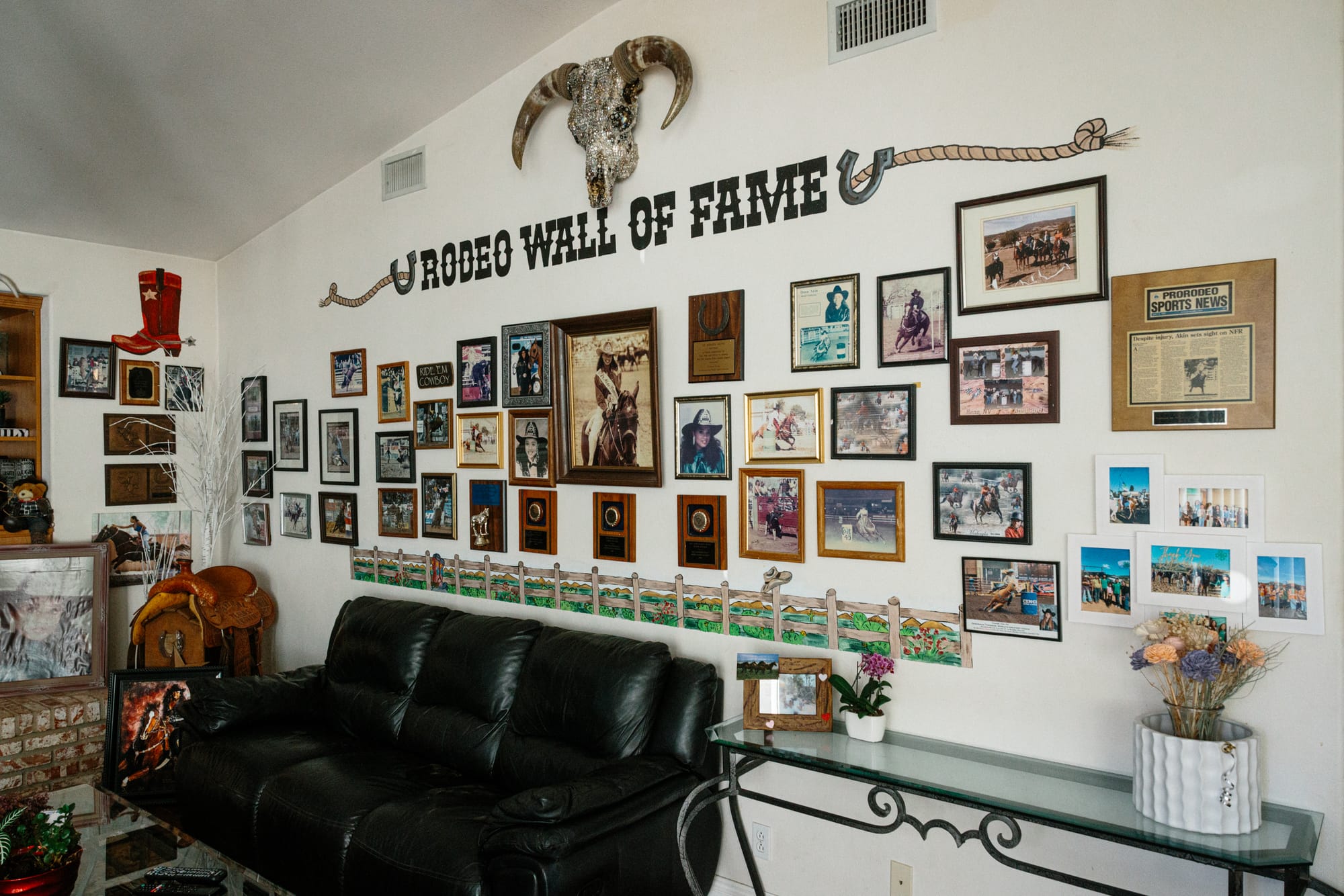 DeBoraha Townson's "Rodeo Wall of Fame" in the living room of her home in Agua Dulce, California. It shows awards, photos and press clippings of her and her children during rodeo competitions.