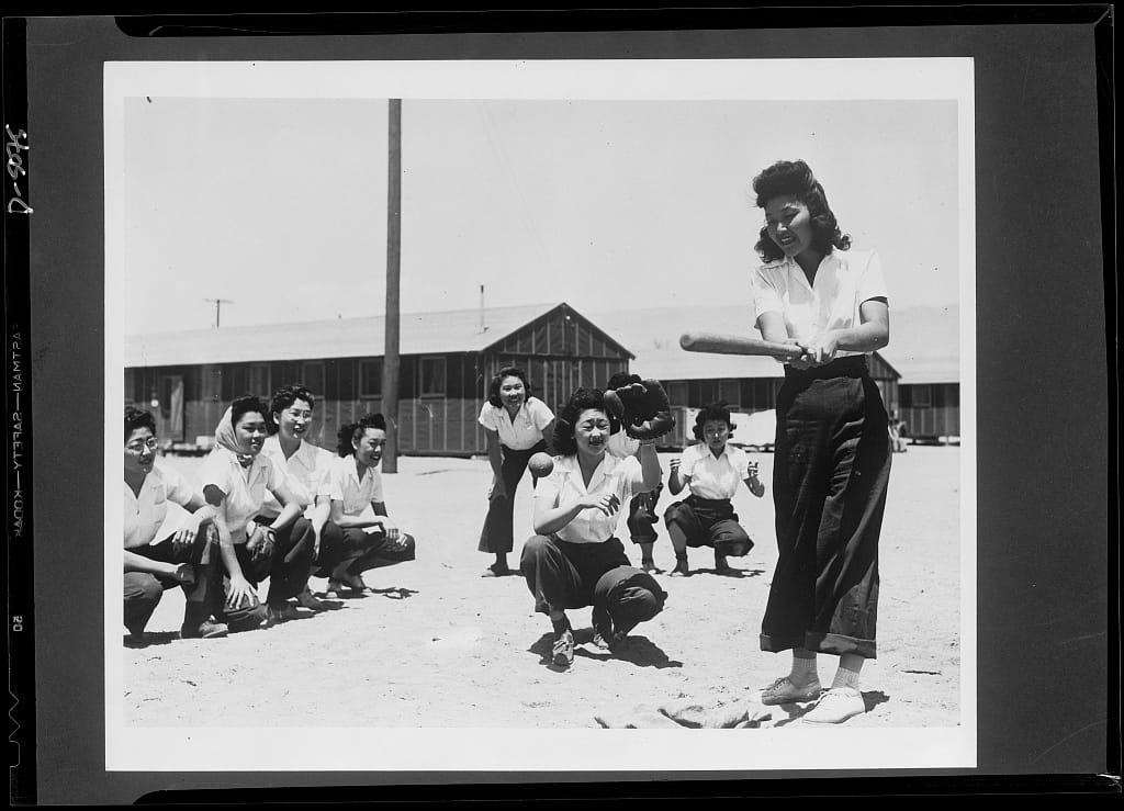 Women play softball at the Manzanar War Relocation Center. Photo courtesy Library of Congress.