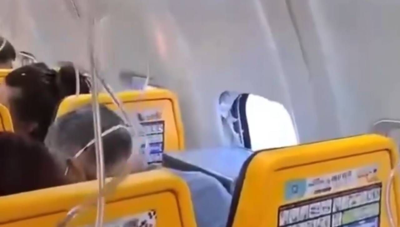 Ryanair passenger, 61, nearly sucked out of plane after engine debris shatters window