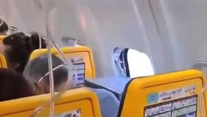 Ryanair passenger, 61, nearly sucked out of plane after engine debris shatters window