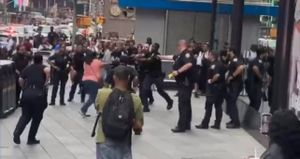 Knife-wielding woman shot after stabbing in Times Square