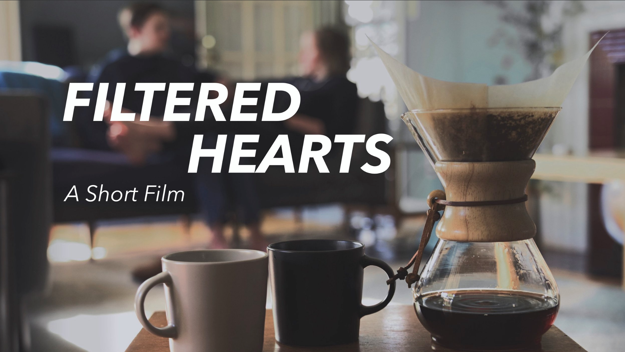Two mugs of coffee sit on a table in front of blurred people behind the title "Filtered Hearts."